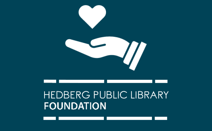 hand holding a heart with Hedberg Public Library Foundation logo