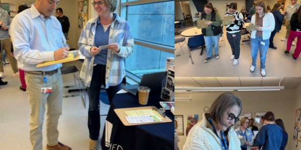 Blain's Supply employees signing up for library cards