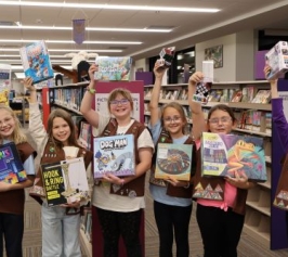 Girl Scouts donate games