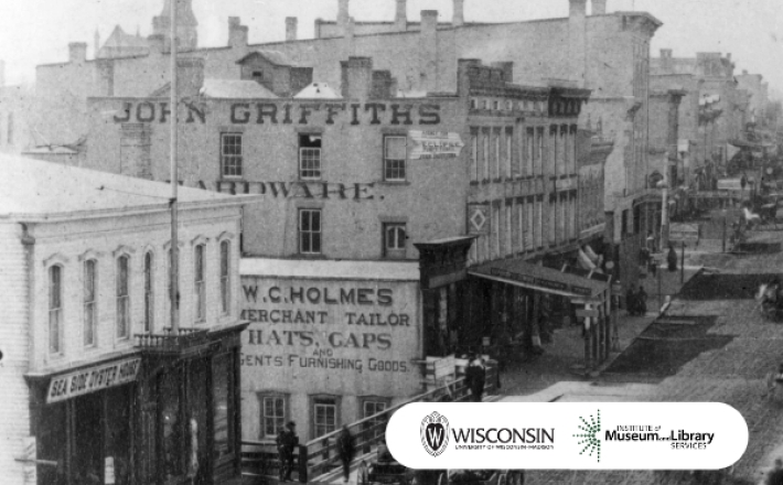 Black and white photo of Janesville's Main Street in the 1800s