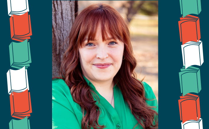 woman with long red hair wearing green shirt